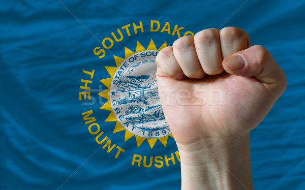 Stock photo: us state flag of south dakota with hard fist in front of it symb