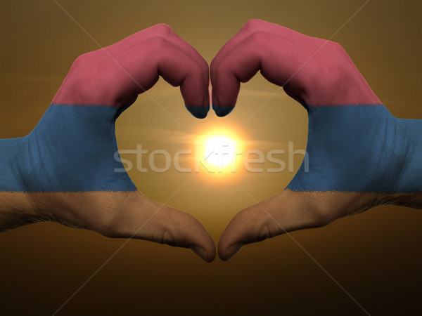 Heart and love gesture by hands colored in armenia flag during b Stock photo © vepar5