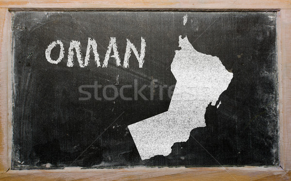 outline map of oman on blackboard  Stock photo © vepar5