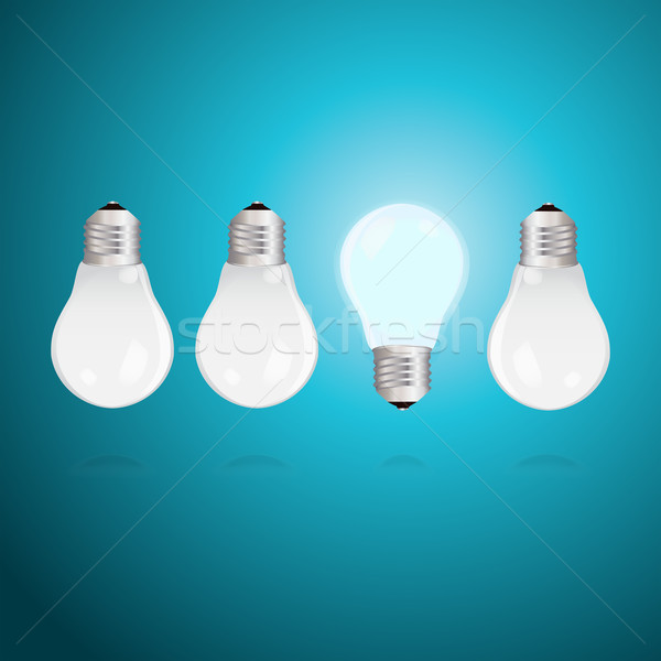 Idea concept with light bulbs on a blue background Stock photo © veralub