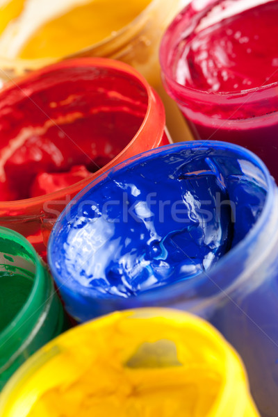 Colourful paints and paintbrushes Stock photo © veralub