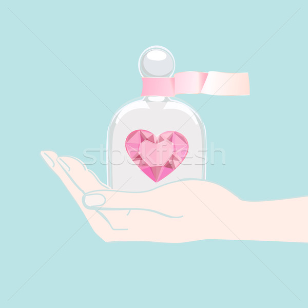 Hand offering a heart under a glass cover Stock photo © veralub