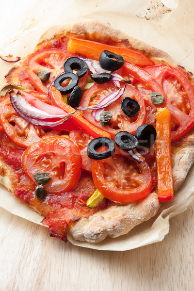 Delicious homemade crusty pizza Stock photo © veralub