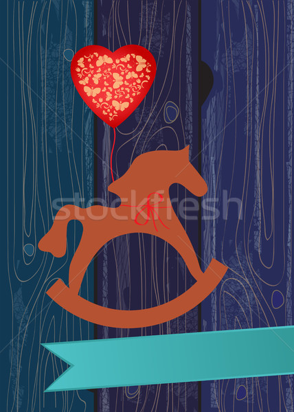 Rocking horse with a heart shaped balloon Stock photo © veralub