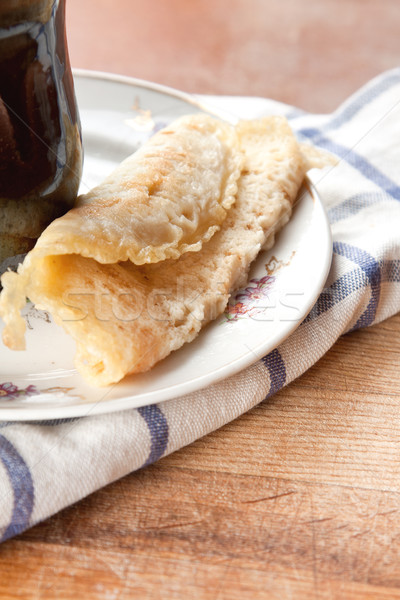 Rolled batter pancake with filling Stock photo © veralub