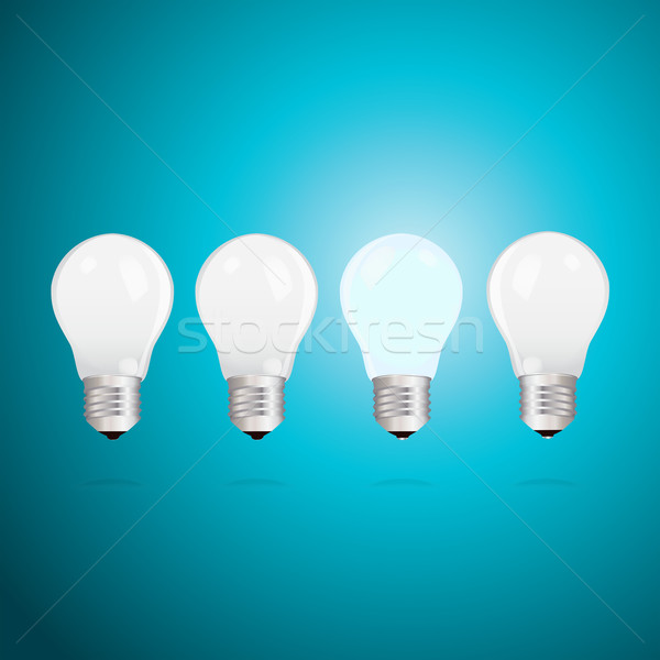 Idea concept with light bulbs on a blue background Stock photo © veralub