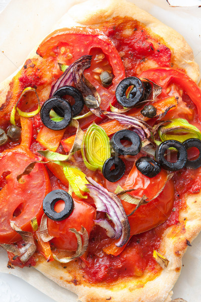 Delicious homemade crusty pizza Stock photo © veralub