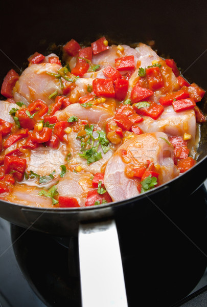 Chicken pan fry with red peppers Stock photo © veralub
