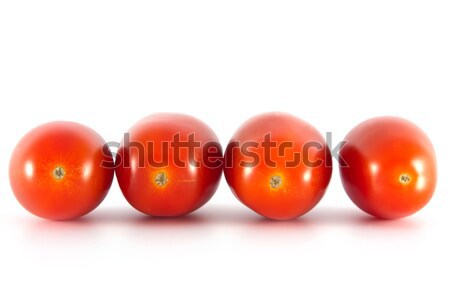 Fraîches juteuse tomates quatre rouge rangée Photo stock © veralub