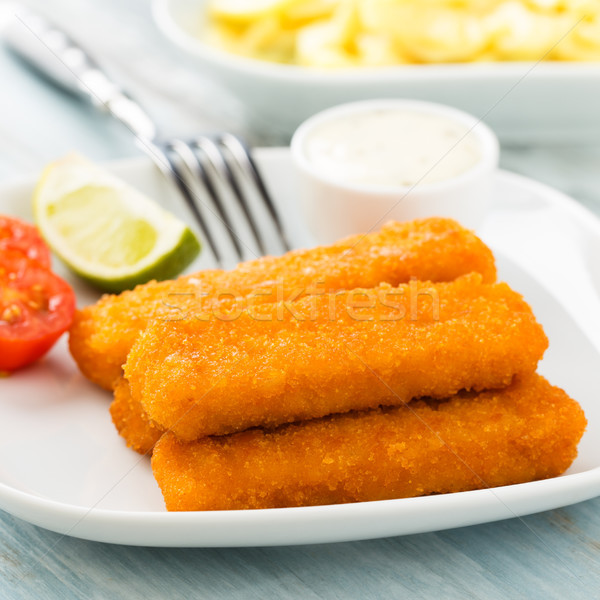 Fish fingers and potato salad Stock photo © vertmedia