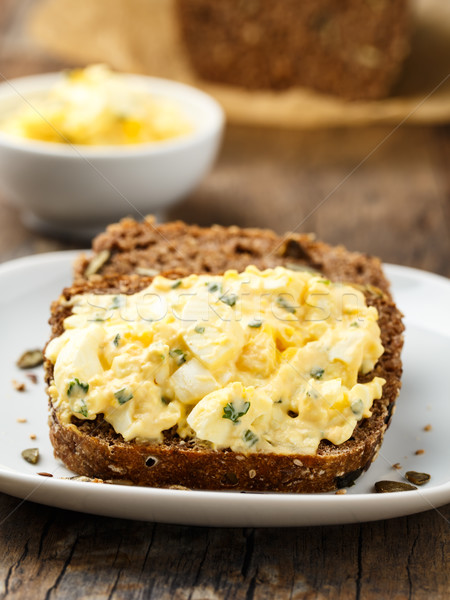Uovo insalata pane fatto in casa semi di zucca colazione Foto d'archivio © vertmedia