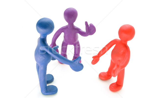 Colored plasticine puppets talking on white background Stock photo © vetdoctor