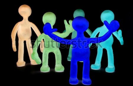 Shaded plasticine puppets standing on black background Stock photo © vetdoctor