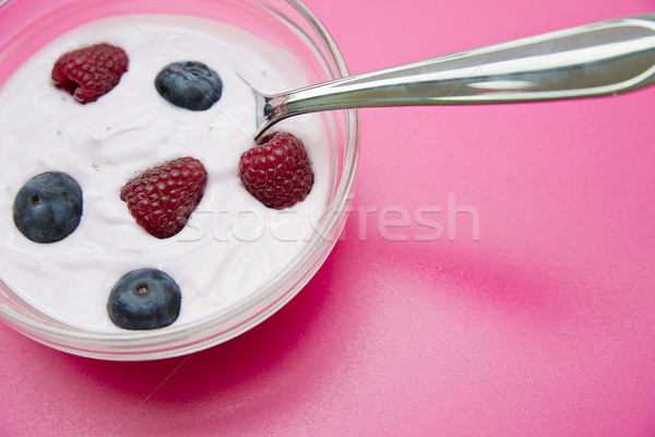 Bowl with jogurt and chromed spoon in Stock photo © vetdoctor