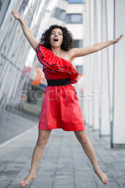 Woman in red dress jump Stock photo © vetdoctor