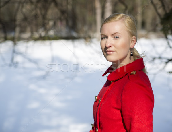 Woman in red coat with firmly look Stock photo © vetdoctor