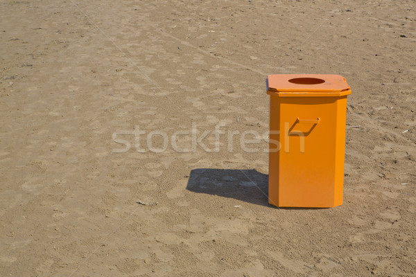 Orange bin  standing in the beach Stock photo © vetdoctor