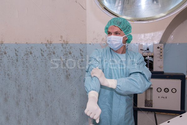 Surgeon prepare its clothes before coming surgery Stock photo © vetdoctor