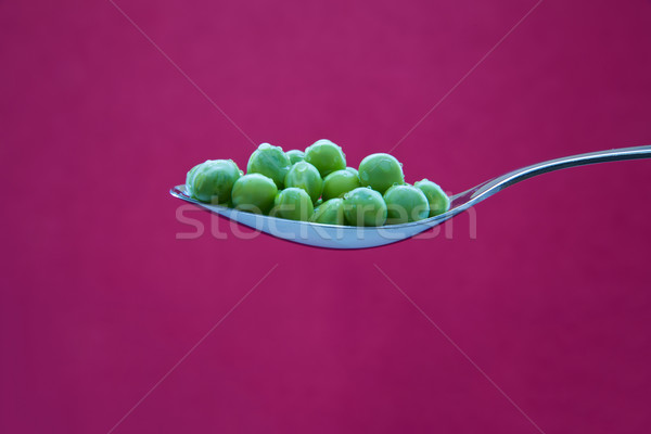 Green peas on metal chromed spoon Stock photo © vetdoctor