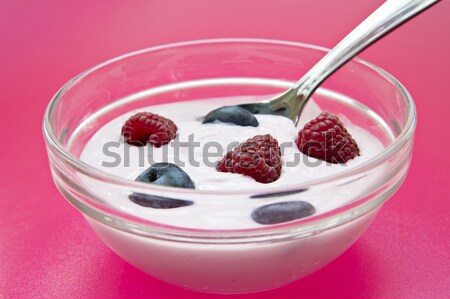 Jogurt has fresh raspberries and blueberries Stock photo © vetdoctor