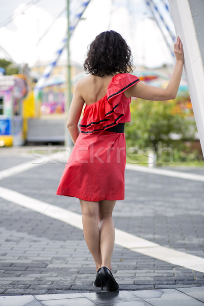 Woman in red dress moving towards Stock photo © vetdoctor