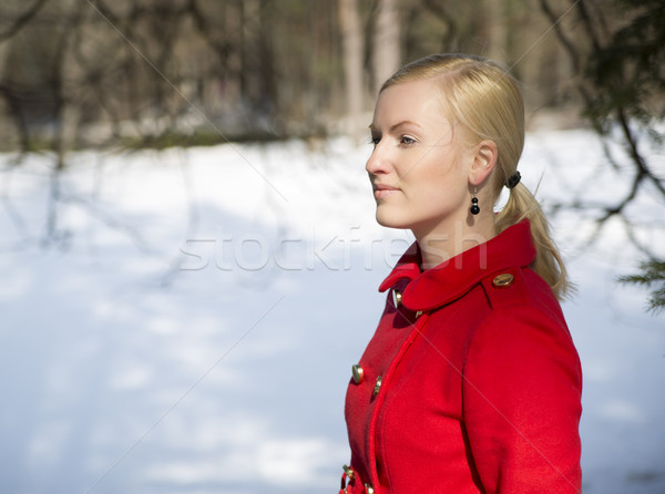 Young woman in coat thinking about something Stock photo © vetdoctor