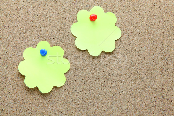two flower shape memo paper on cork board Stock photo © vichie81