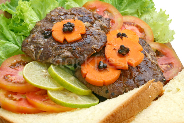 Marhahús közelkép grill hamburger zöldség kenyér Stock fotó © vichie81
