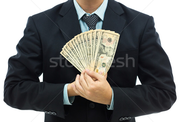 Businessman holding money Stock photo © vichie81