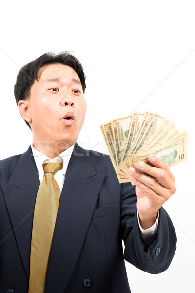 Businessman with money Stock photo © vichie81