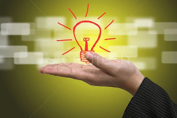 Idée innovation ampoule affaires main nouvelle Photo stock © vichie81