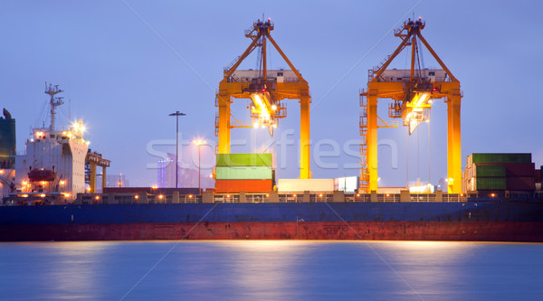 Teherhajó kikötő alkonyat panoráma konténer teher Stock fotó © vichie81