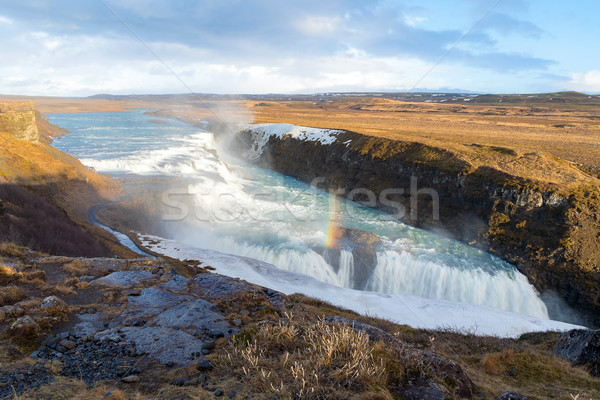 Wodospad Islandia zimą złoty wody chmury Zdjęcia stock © vichie81