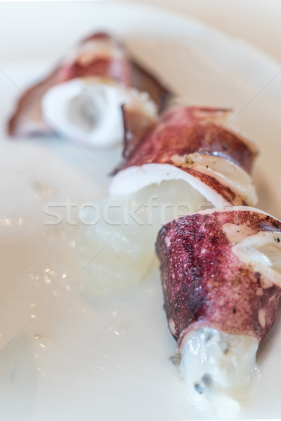 Gratar calmar fructe de mare peşte ou bucătar-şef Imagine de stoc © vichie81