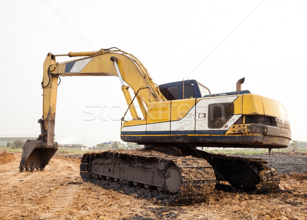 Bagger stehen Bau Erde Sand arbeiten Stock foto © vichie81