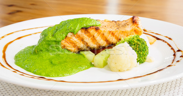 salmon steak with pesto sauce Stock photo © vichie81