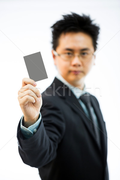 Businessman holding business name card Stock photo © vichie81