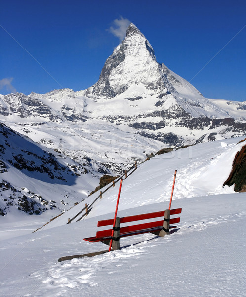 Red chair and Matterhorn, logo of Toblerone chocolate, located i Stock photo © vichie81