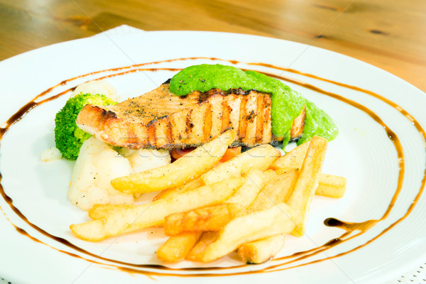 salmon steak with pesto sauce Stock photo © vichie81