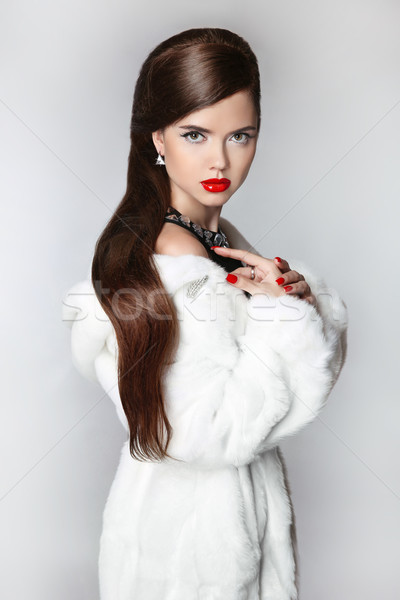 Fashion elegant woman in fur coat, Brunette with red lips, hairs Stock photo © Victoria_Andreas