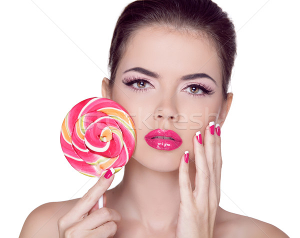 Bright makeup. Beauty Girl Portrait holding Colorful lollipop. P Stock photo © Victoria_Andreas