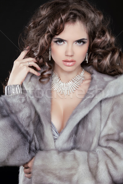 Fashion winter woman model wearing in mink fur coat with long wa Stock photo © Victoria_Andreas