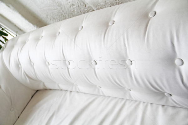 Back of white leather sofa. Textured button. Perspective of ches Stock photo © Victoria_Andreas