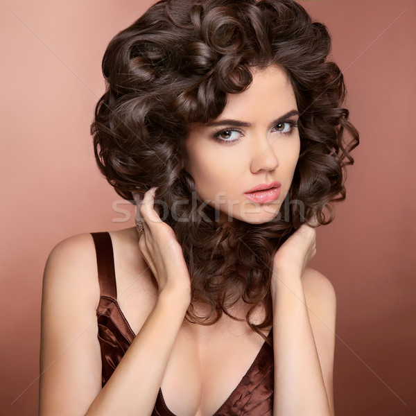 Gyönyörű barna hajú lány egészséges göndör haj smink Stock fotó © Victoria_Andreas