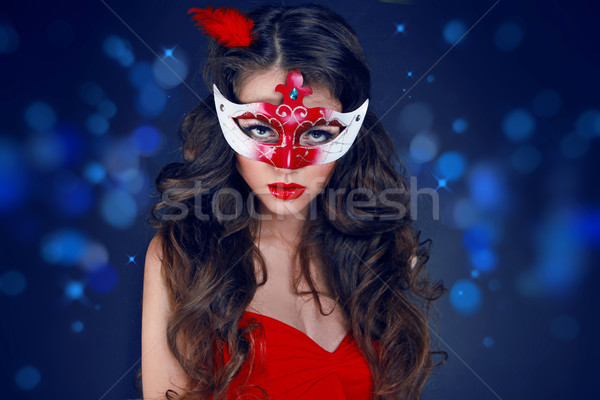 Stock photo: Masquerade. Beautiful Girl in Carnival mask over Holiday Bokeh G