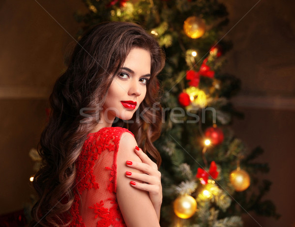 Christmas manicure. Beautiful smiling woman portrait. Makeup. He Stock photo © Victoria_Andreas