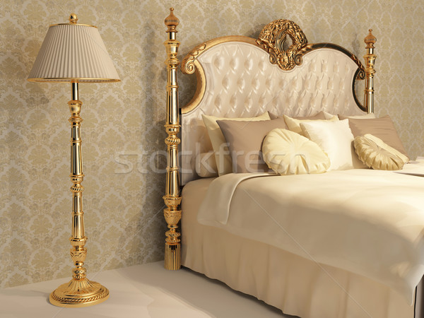 Luxurious bed with golden frame and stand lamp in royal bedroom  Stock photo © Victoria_Andreas