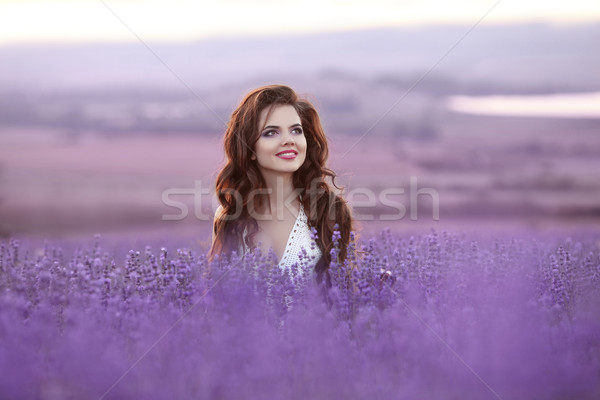 Beautiful young woman portrait in lavender field. Attractive bru Stock photo © Victoria_Andreas
