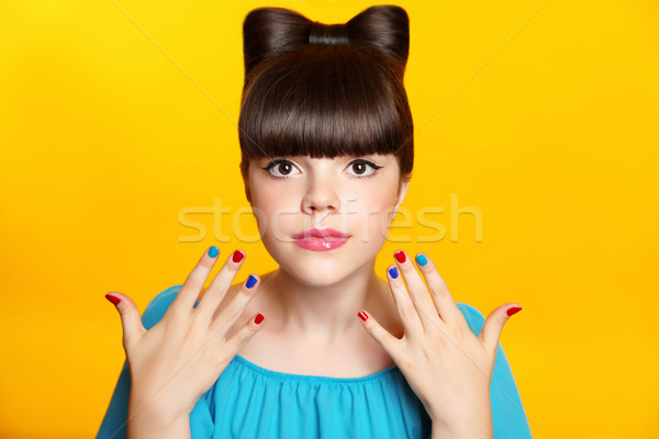 Makeup. Beautiful teen girl with bow hairstyle and multicolor ma Stock photo © Victoria_Andreas