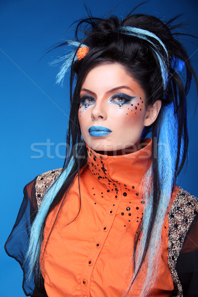 Makeup. Rock hairstyle. Portrait of young beautiful punk model w Stock photo © Victoria_Andreas